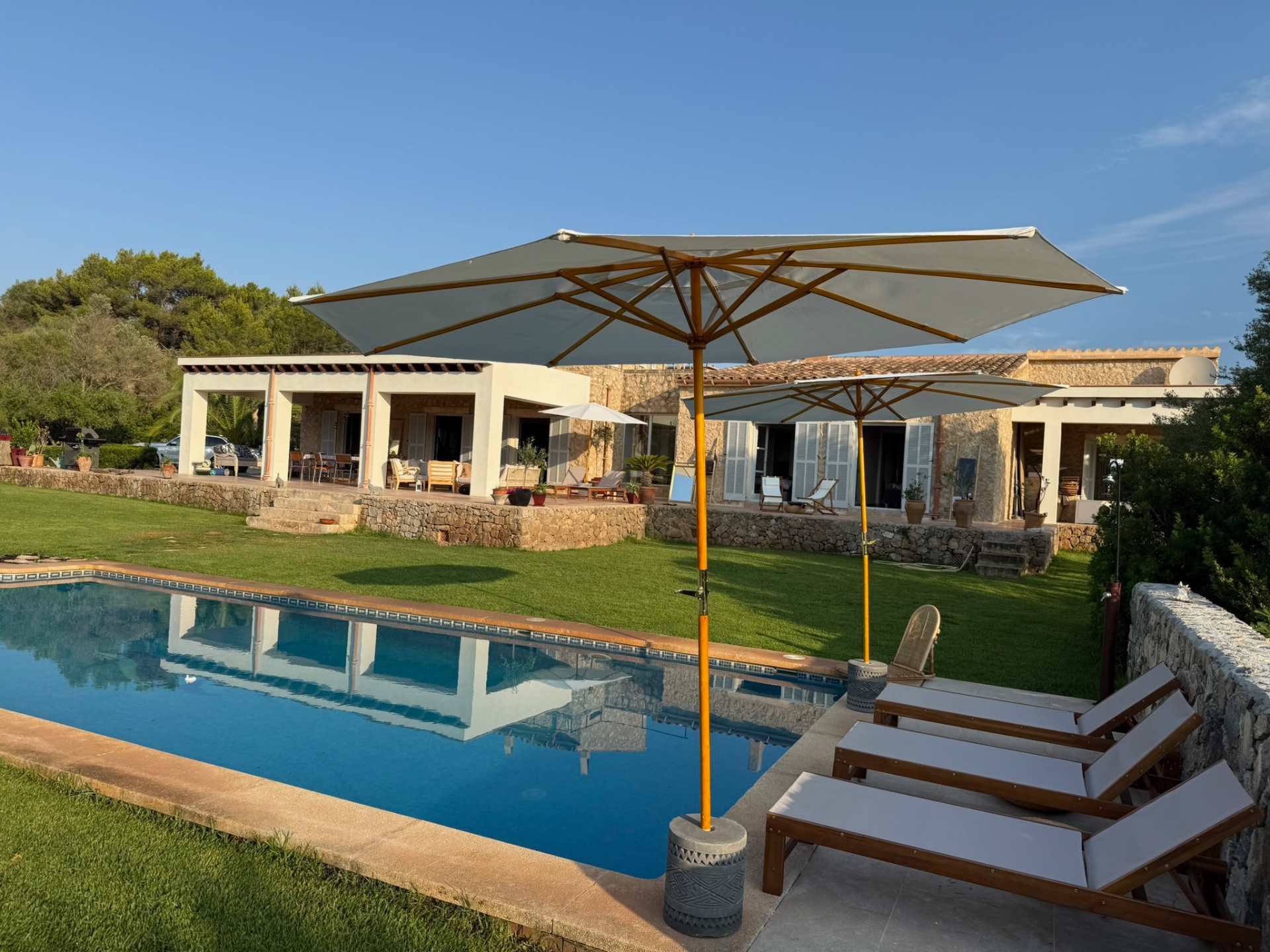 Lumos 2224 — pool and house at golden hour